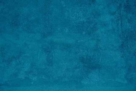 Cool grunge background of an old turquoise surface