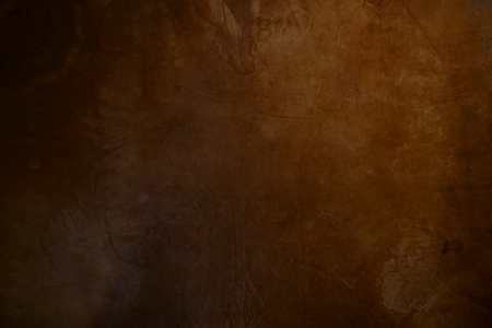 Old rustic dark brown leather background textureの写真素材