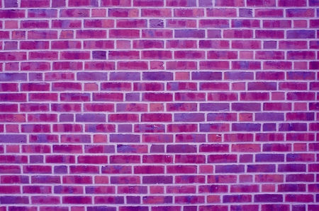 Purple pink brick wall backgroundの写真素材