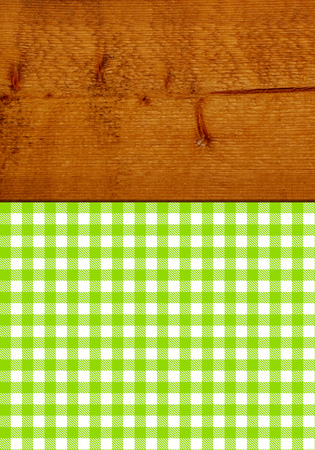 Background texture: Wooden table with green and white checkered tableclothの写真素材
