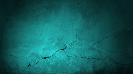 Background texture of grey grunge wall with cracks and scratchesの写真素材