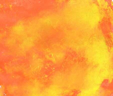 Hand painted watercolor texture with soft colors orange and yellowの写真素材
