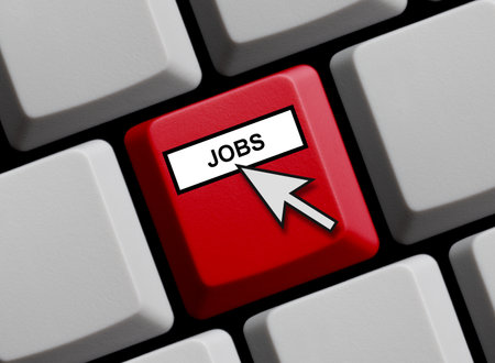 Red computer keyboard showing: Jobs 3D illustrationの写真素材