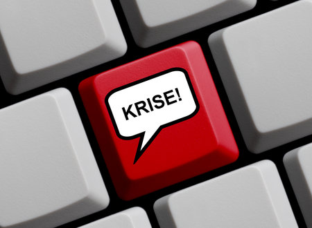 Red computer keyboard: Crisis in german language - 3d illustrationの写真素材