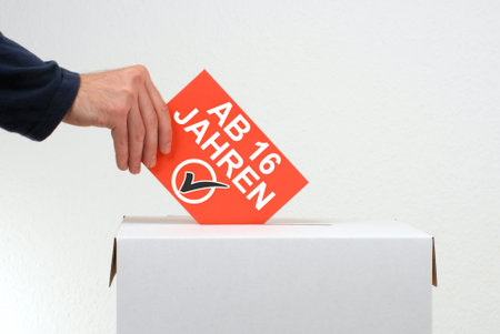 Right to vote: 16 years german - Envelope with ballot boxの写真素材
