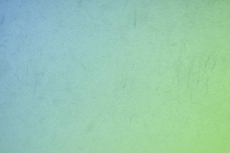 Elegant decorative grunge wall with gradient green blue colorの写真素材