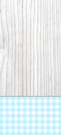 Bright wooden board with rustic tradional tablecloth checkered blue and whiteの写真素材