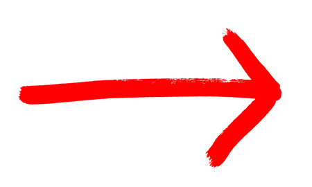 Red sketch of painted arrow showing directionの写真素材