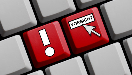 Computer Keyboard showing Attention in german language - 3d illustrationの写真素材