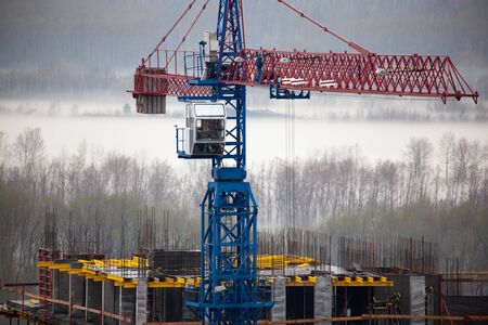 Construction crane working in winter