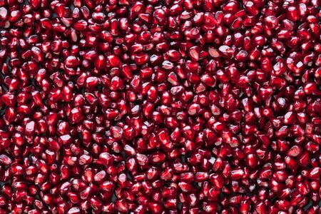 A lot of peeled pomegranate's seedの写真素材