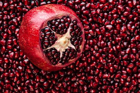 Pilled pomegranate with lots of seedsの写真素材
