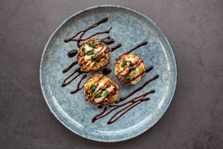 Stuffed mushroom caps with cream cheese, breadcrumbs and parmesanの写真素材