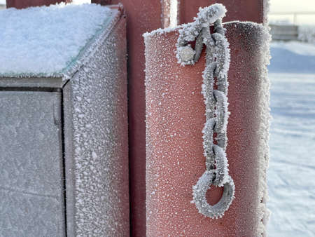 Close-up of a chain with frost in winterの写真素材