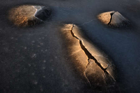 Frozen rocks in the water of NÃ¤sbokrok Nature reserve, Halland, Sweden, Europeの写真素材
