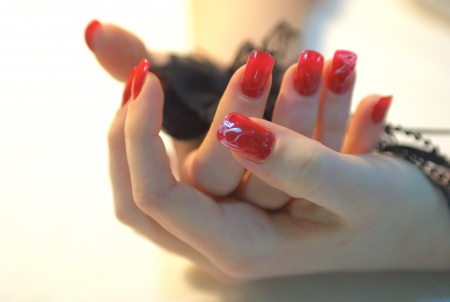 hands, arms, red nailsの写真素材