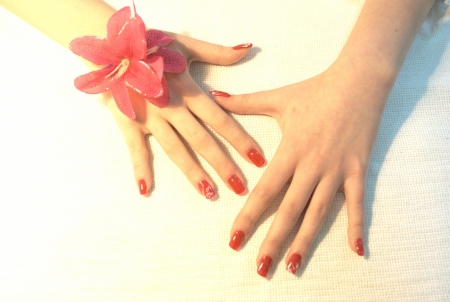hands, arms, red nailsの写真素材