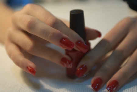 hands, arms, red nailsの写真素材