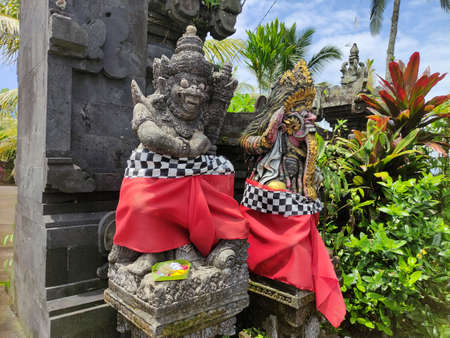 a statue in front of a temple in Baliの写真素材