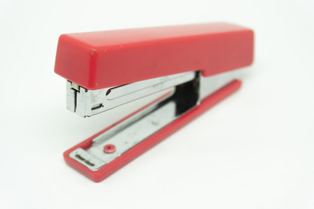 pink staples on a white background isolatedの写真素材