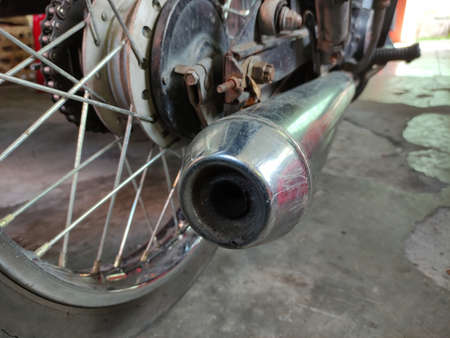 close-up photo of old motorcycle exhaust