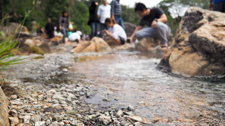 Tourists at watercourseの写真素材
