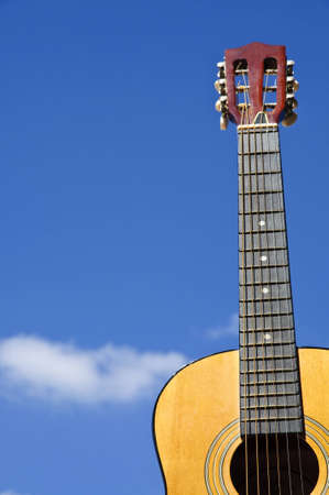 Guitar on blue sky
