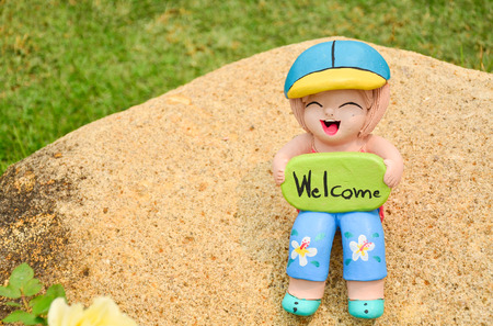 Cute Clay doll in the gardenの写真素材