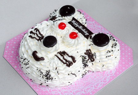 Birthday Cake in white bear head shapeの写真素材