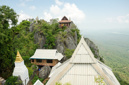 Wat Chalermprakiat at Lampang province, The beauty of  the temple is located on a high mountain. people of Thailand and foreigners came to tourist the temple. they are to walk up the difficulty but trails filled with natural fertility. it is a top of Unseのeditorial素材