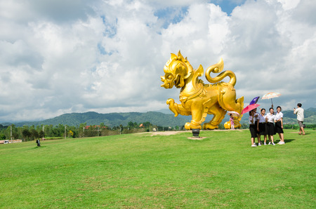CHIANG RAI, THAILAND - November 15,2014 : Tourist come to Singha Park and take a photo with Singha statue on November 15,2014 in Chiang Rai,Thailand.のeditorial素材