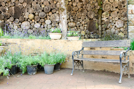 old wooden garden furniture in living garden