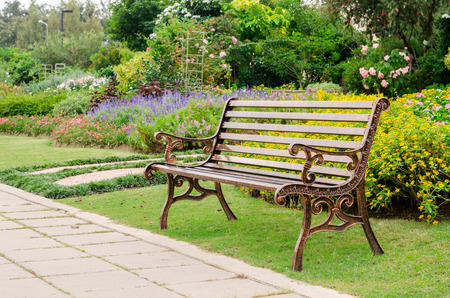Long iron bench in parkの写真素材