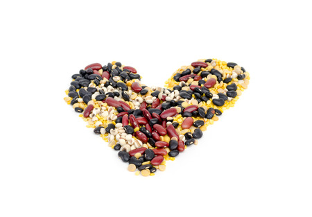 split soy beans,mung beans,red kidney bean,black bean and Job's tears in heart shapeの写真素材