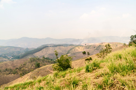 disaster dry areas of mountain with wildfire smog in summer Thailand