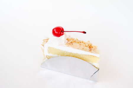 Piece of layer cake on white backgroundの写真素材