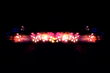 abstract art of flower shaped bokeh light on black background