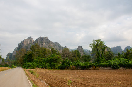 landscape view of mountain in Ban Mung subdistrict in the Noen Maprang District of Phitsanulok Province, Thailand.の写真素材