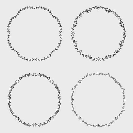 Set of hand drawn floral wreaths. Vector design elements.のイラスト素材