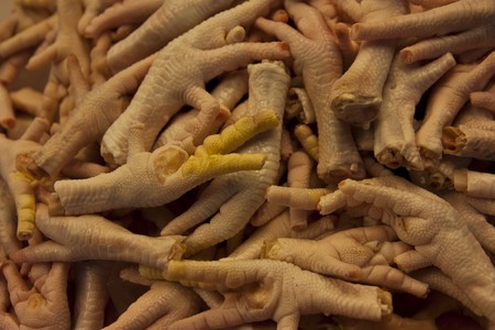Chicken feets sold at Maketの写真素材