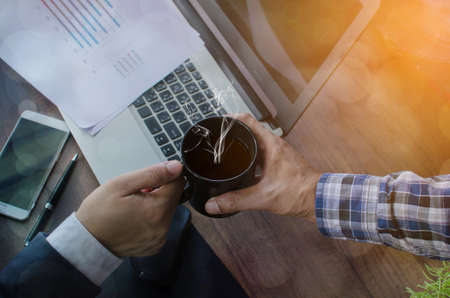 Close up of man serving coffee