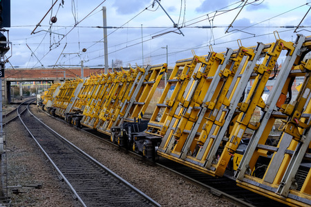 Heavy duty railway engineering machinerey heads southのeditorial素材