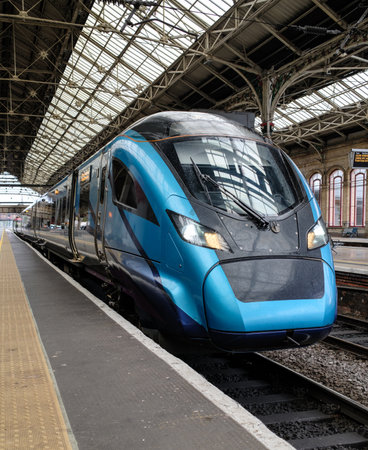 Sleek high-speed train poised at the station, ready for the next bustling journey