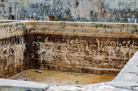 Texture of rust on weathered concrete structure with worn and weathered surface