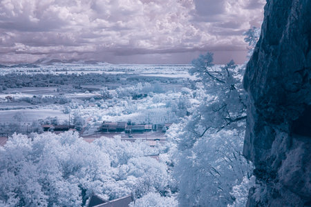 A breathtaking infrared photograph captures a dramatic landscape of a vastの写真素材
