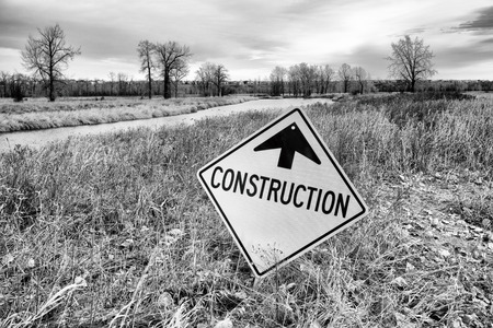 Construction sign beside the Bow River in Calgary, Alberta.の写真素材