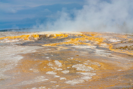 Landscape of colourful minerals located in the Old Faithful area of Yellowstone National Park, Wyoming.の写真素材