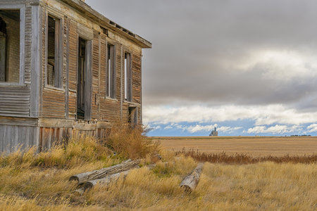 Looking at the door of an abandoned farm house, Saskatchewan, Canadaの写真素材