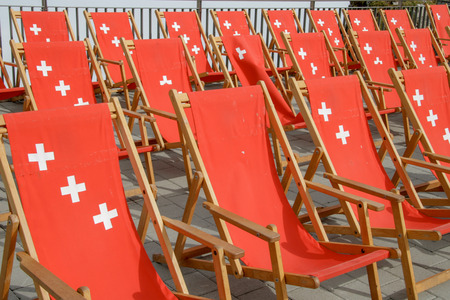 Red canvas chair with cross mark, Switzerlandの写真素材