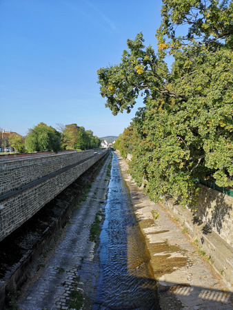 Small canal infront of SchÃ¶nbrunn palaceの写真素材